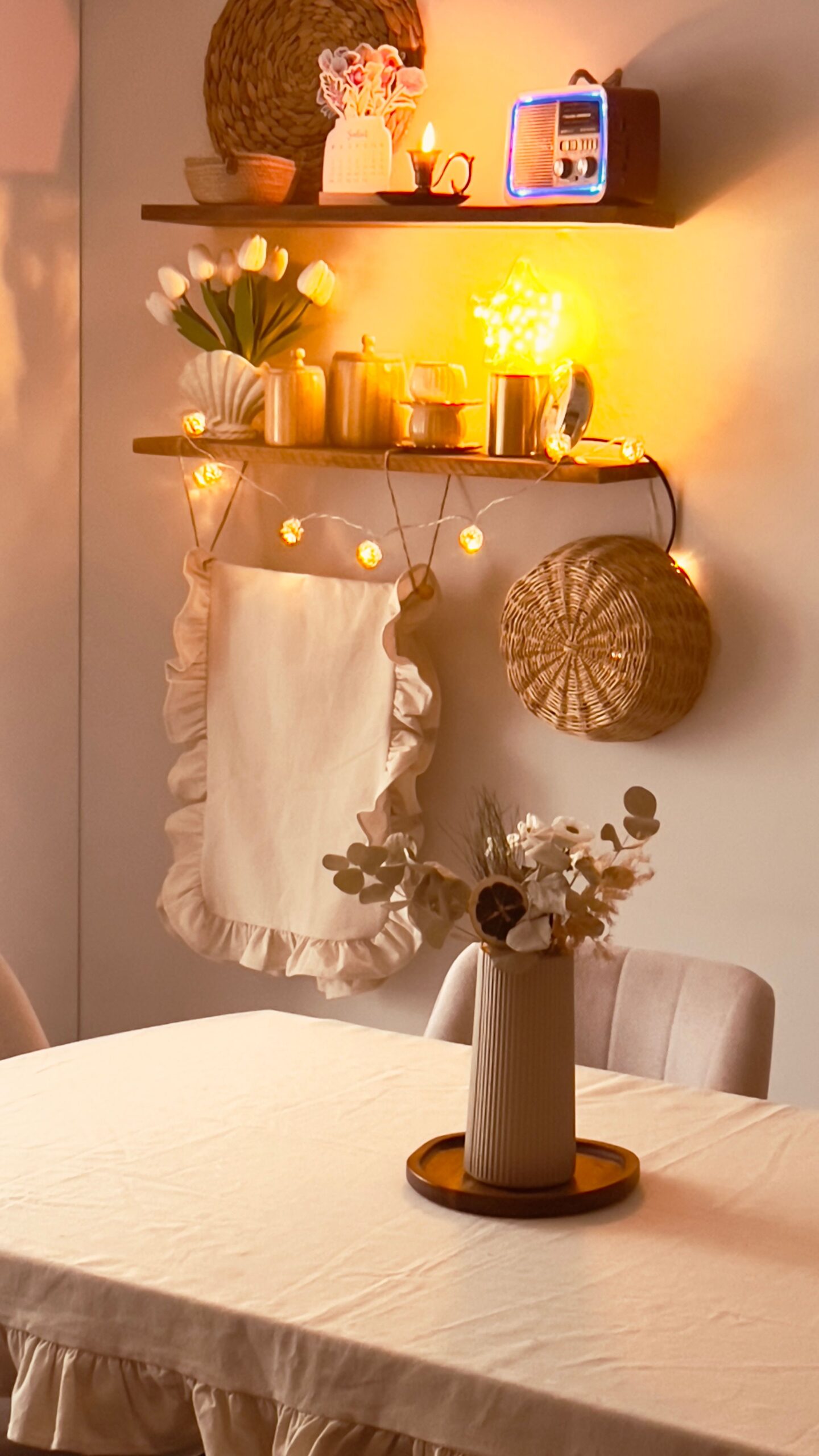 Warm aesthetic shelf decor showcasing smart storage ideas for small apartments with wooden shelves and dried flowers